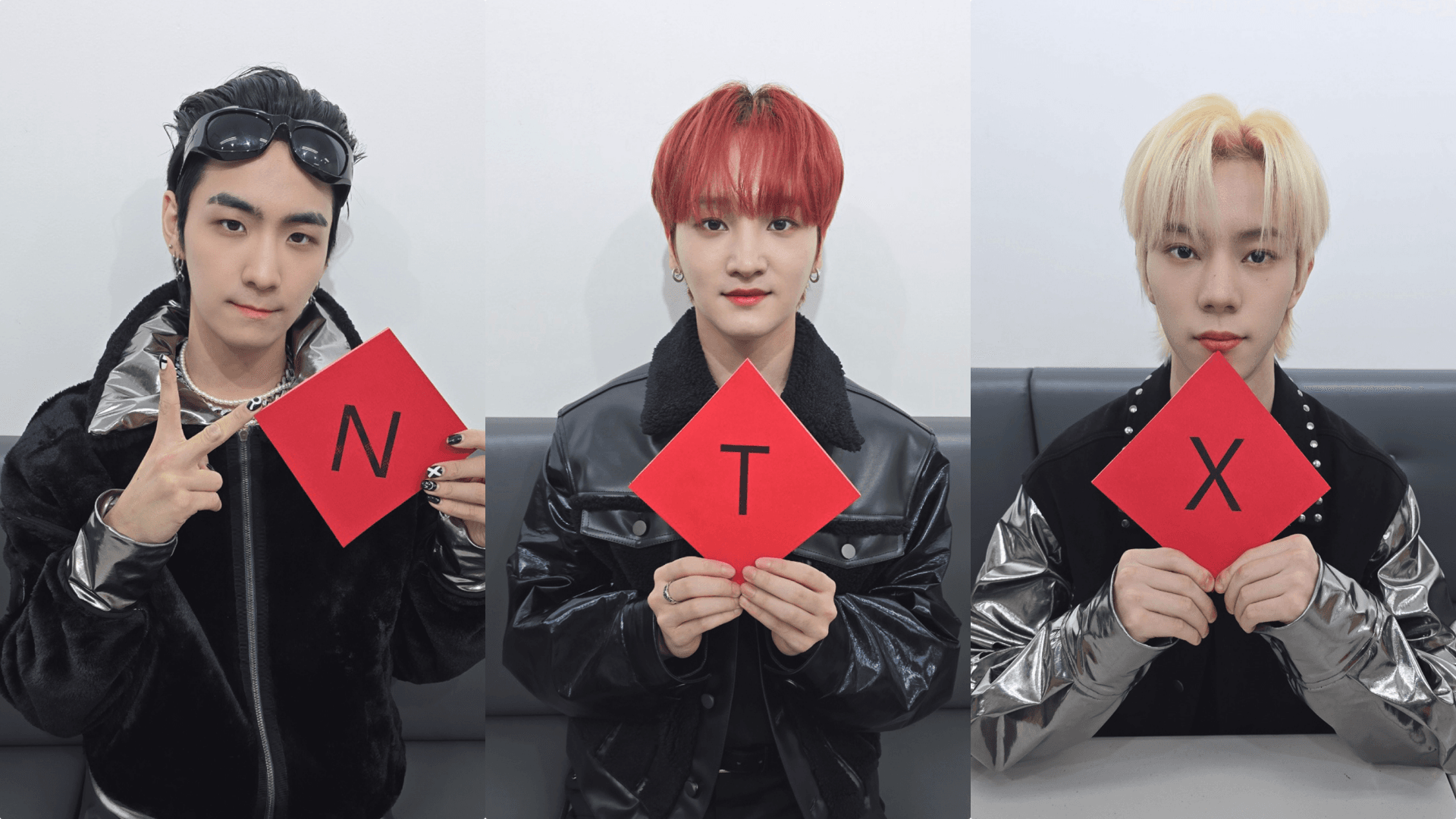 Rawhyun（左起）、恩晧與承元拿著團名「NTX」春聯賀新年。（VICTORY COMPANY  our entertainment提供）