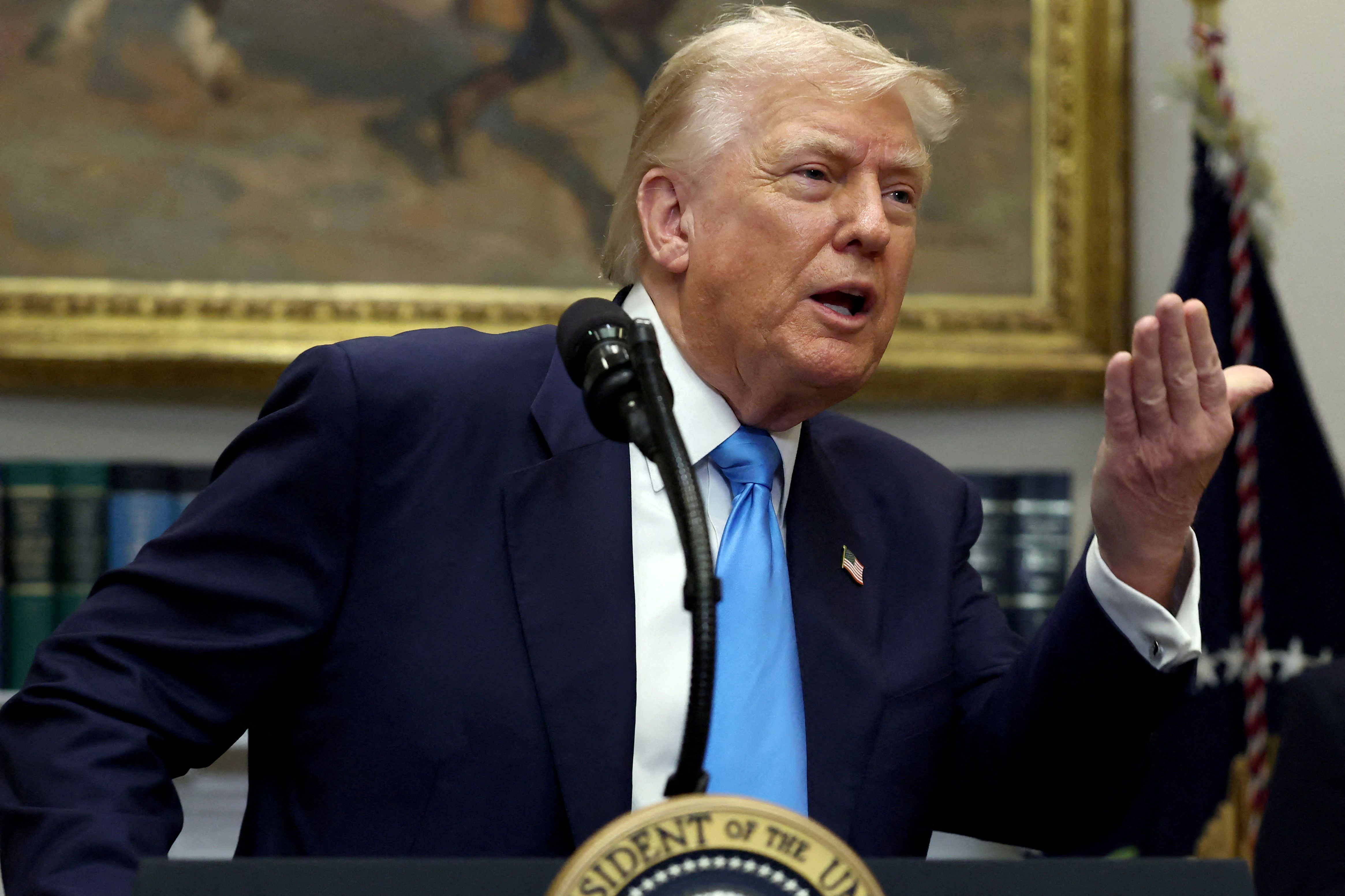 美國總統川普目前專注美中經貿談判與促成烏俄停戰。(資料照,路透社)