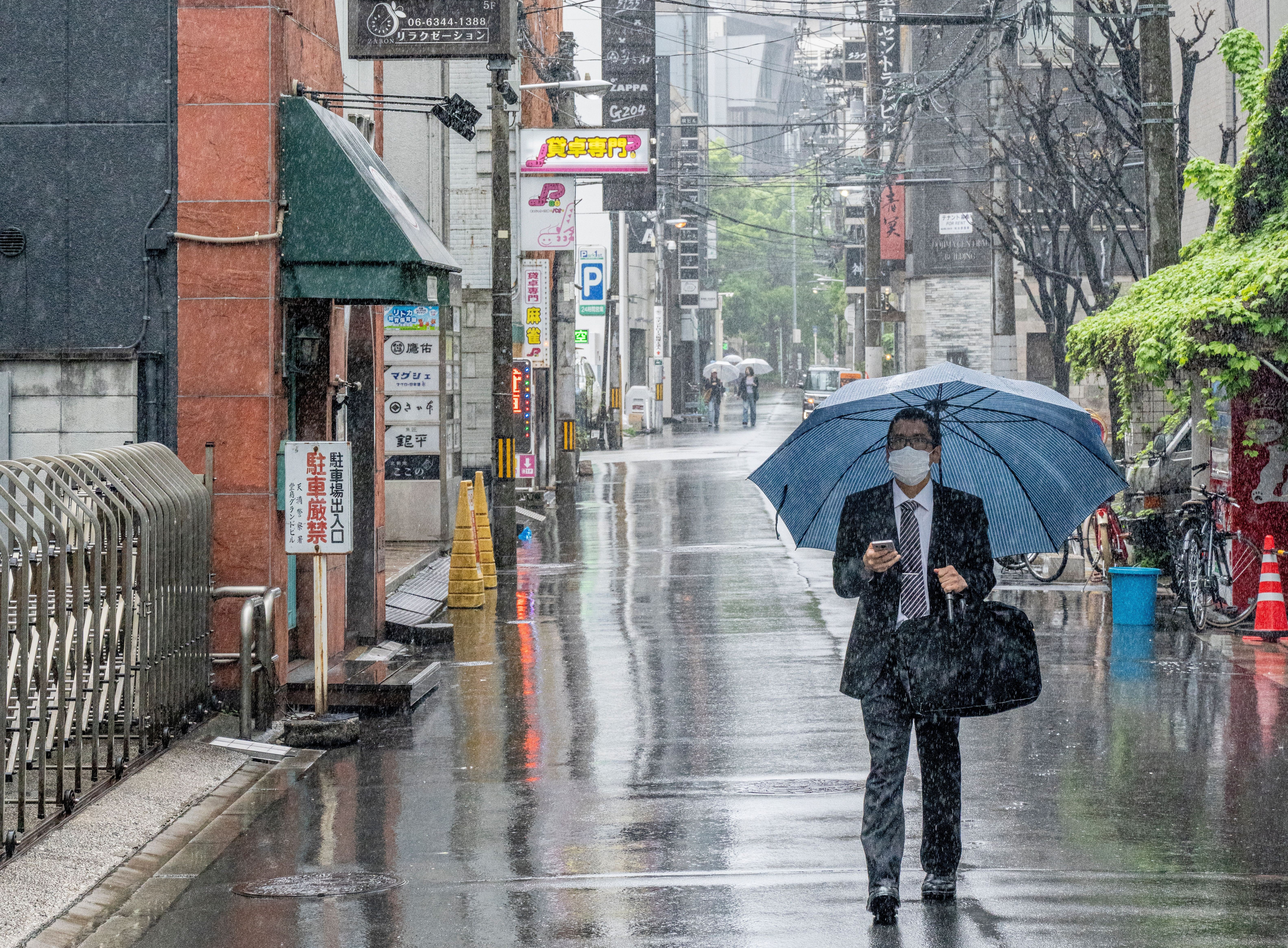 日本東京昨(26日)受到滯留鋒面影響,突然狂風暴雨。(示意圖,翻攝自pexels)