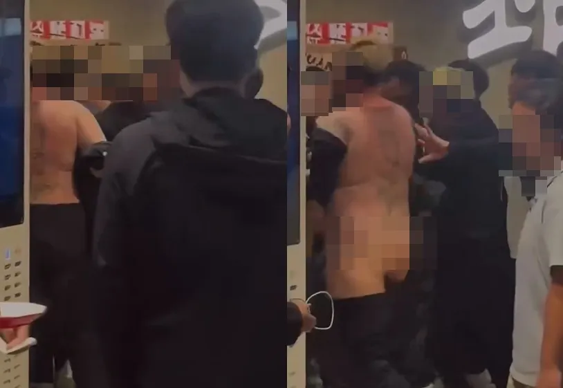 有片／打群架黑衣男脫上衣露刺青　褲子掉下來「超落漆」火爆場面瞬間尷尬