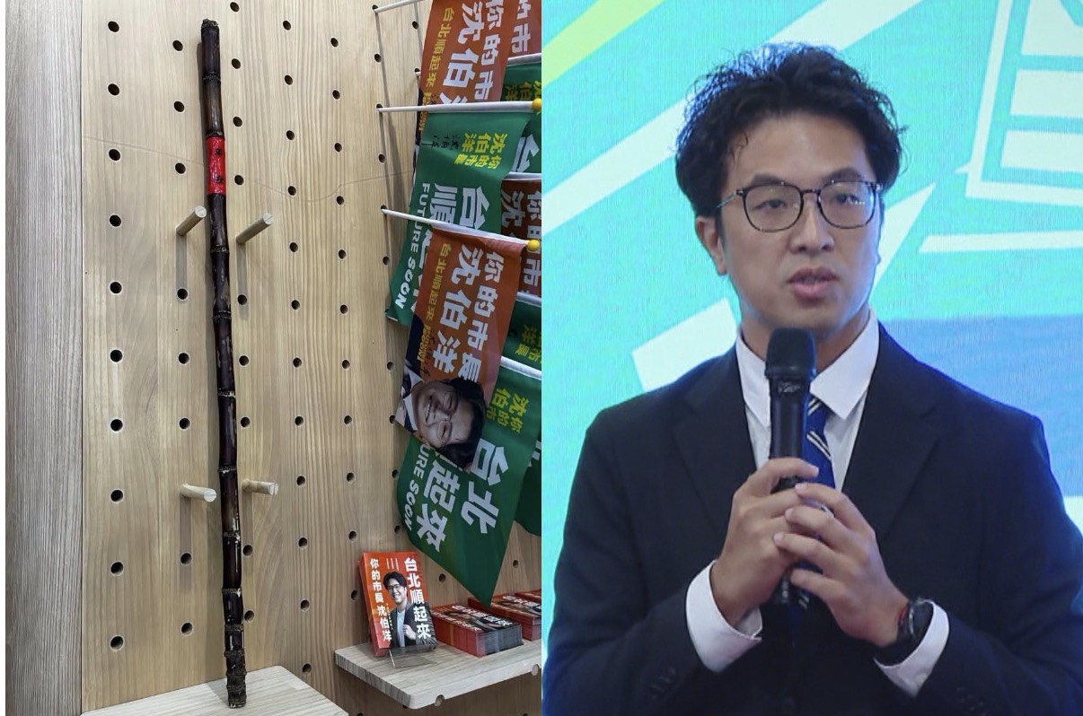 沈伯洋將獲贈的甘蔗由橫放改為直立,象徵節節高升。(翻攝自吳思瑤臉書)